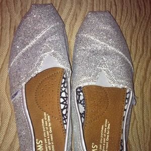 Silver glitter toms size 6.