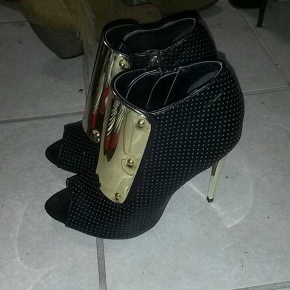 Black and gold booties