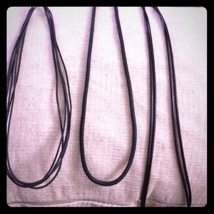 Different black necklace strands