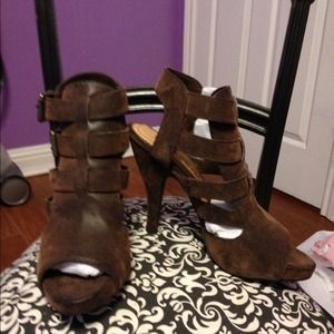Brown bootie like heels. NWT