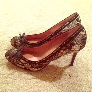 Ann Taylor black lace round-toe pump.