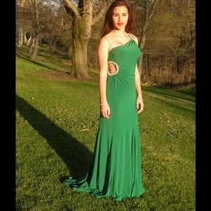 Emerald green gown with jewel encrusted cut-out.