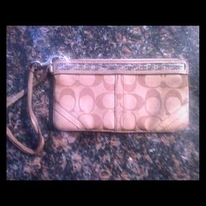 Coach Wristlet with glass bead design