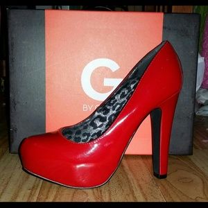Red Guess Pumps.
