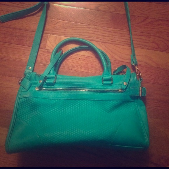 Urban expressions mint/teal purse.
