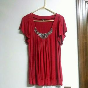 Red top with decorative silver beading