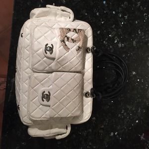 Large white multi-pocket bag