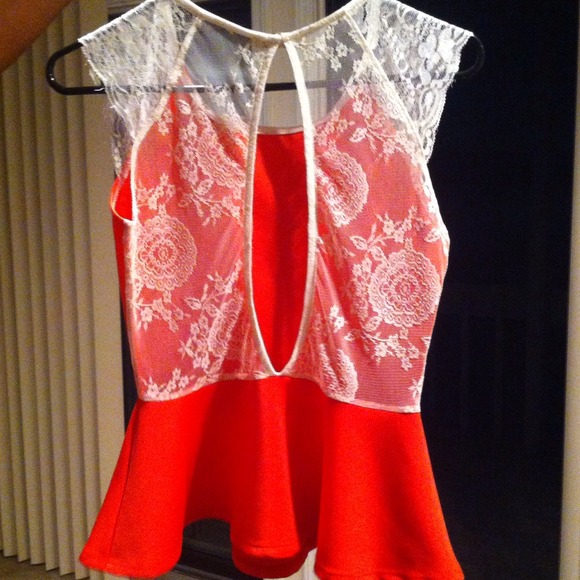 Coral in color Lace with open keyhole back peplum - Picture 2 of 3
