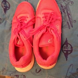 Pink Fila running shoes