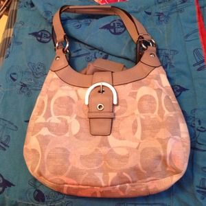 Pink, gray and white Coach purse.