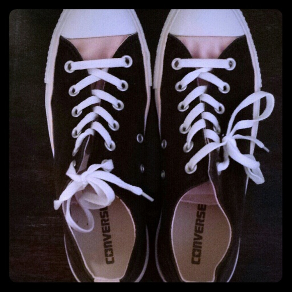 Brown and pink converse