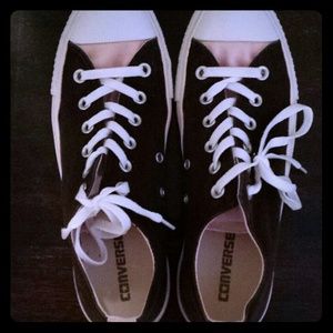 Brown and pink converse