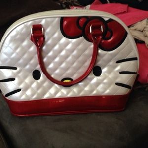 torrid Loungefly Hello Kitty embossed purse.