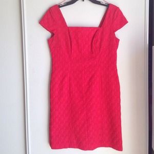 Cute bright red dress.