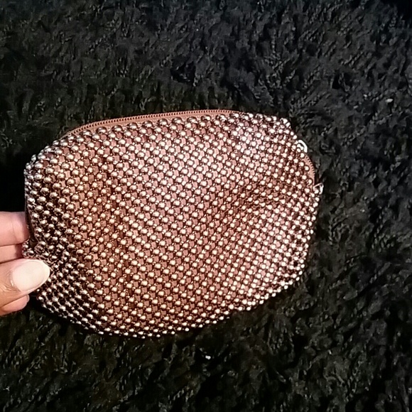 Selling small brozen beaded mesh wrist purse