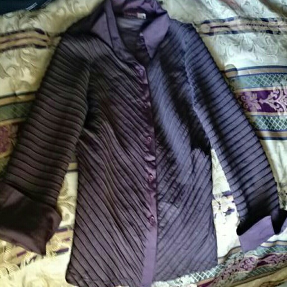 Sheer brown Prada blouse.