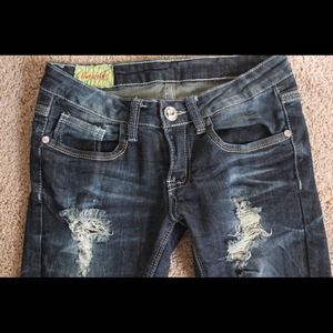 Dark blue destroyed jeans