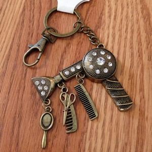 Gold color beautician themed keychain