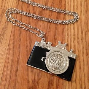 Long necklace with black camera charm