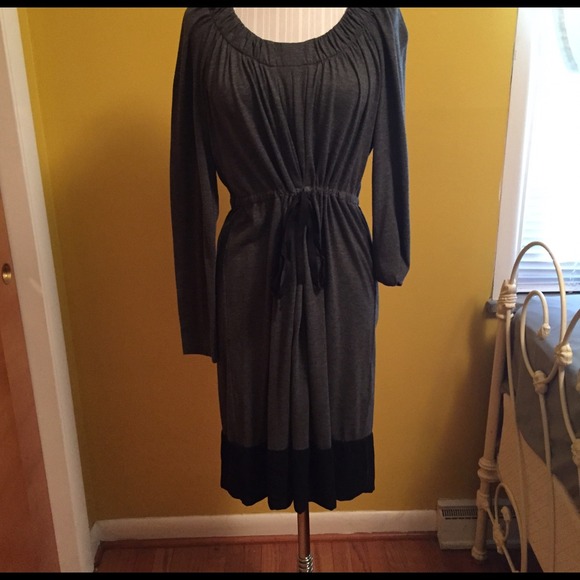 Long sleeve gray dress.