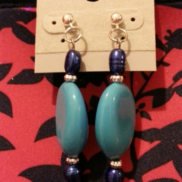 Blue earrings on studs