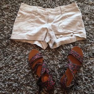 Flowery sandals, and khaki shorts!