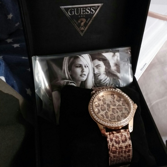 Gold leopard guess watch