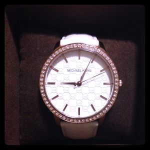 Michela Kors rose gold and white leather watch