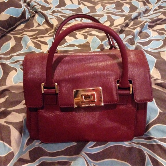 Michael Kors red handbag.