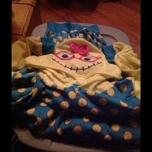 Brand new. Feet less adult onesie w/ hoodie.