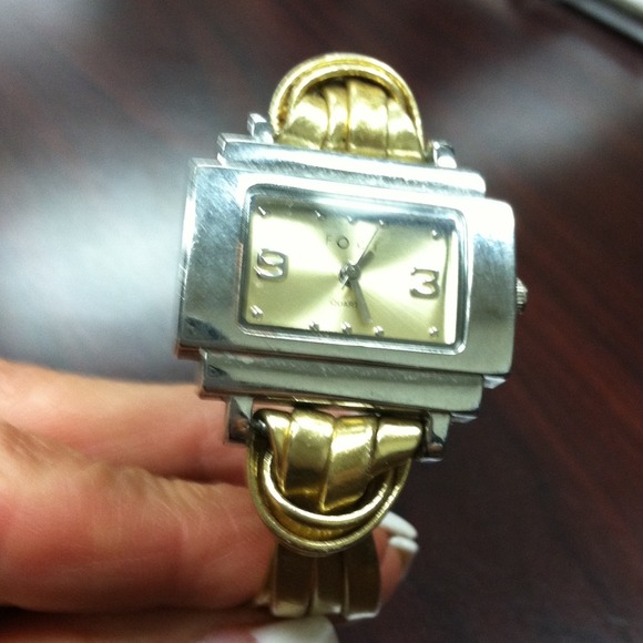 Silver watch with gold band