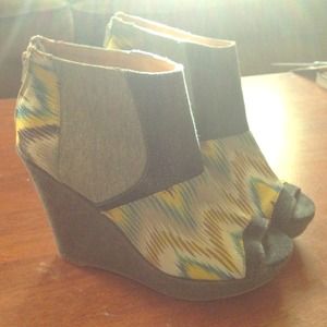 Peep toe wedges.
