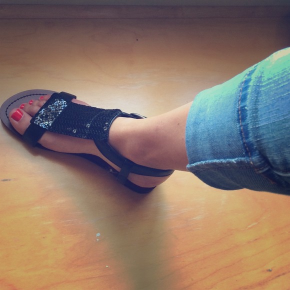 Black sequence sandals.