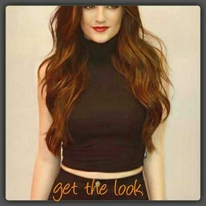 Black sleeveless turtleneck crop top