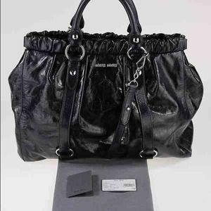 100% Authentic Miu Miu Zaffiro leather handbag