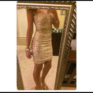 La femme gold sequined and rhinestoned dress.