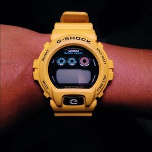Yellow G-shock watch