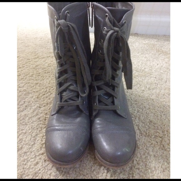 Grey combat boots.