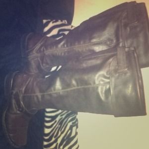 Tall brown leather boots