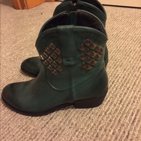 Green studded ankle cowboy boots. Side zip
