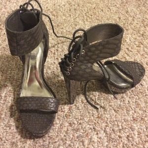 Gray snakeskin colon Stuart ankle strap heels