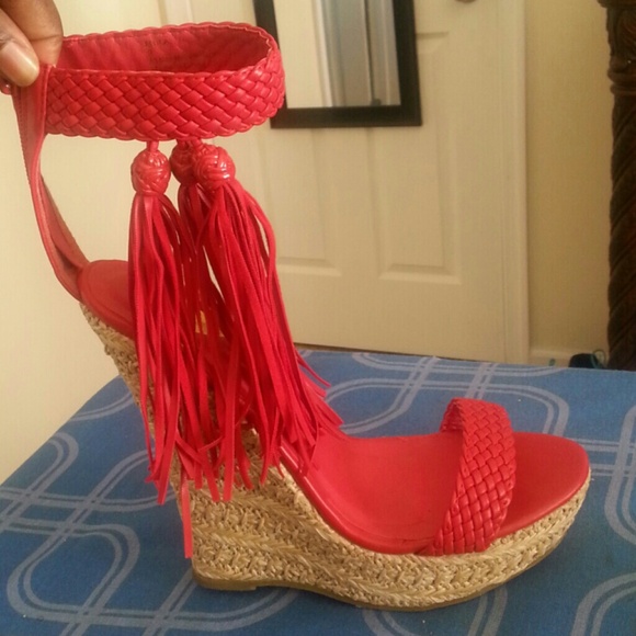 Make a statement in these Sexy Red Tassel Wedges