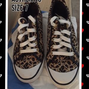 $25 Coach..size 7Neutral colors.