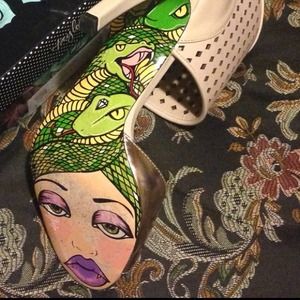 Taylor says nude/rose gold heels