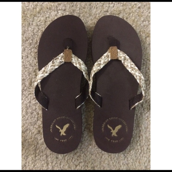 Brand new brown American Eagle flip flops