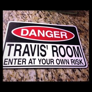 Door metal sign personalized with the name TRAVIS