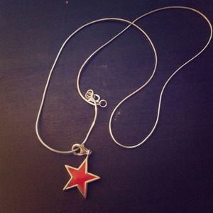 silver necklace with red star. Length is 44cm