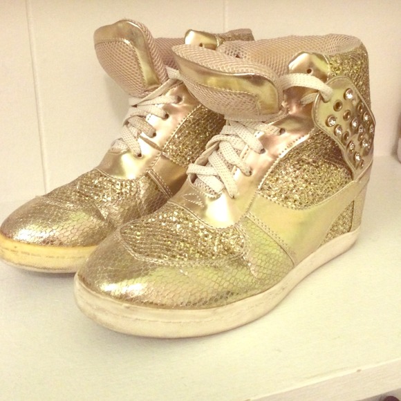 Gold sneakers with wedges