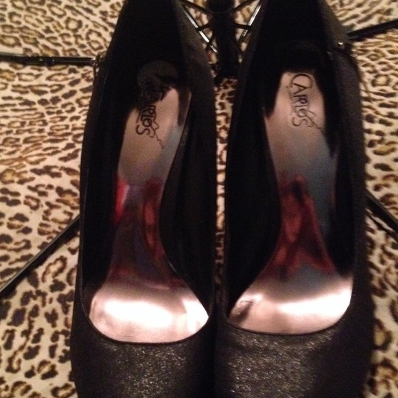 Carlos Santana black pums