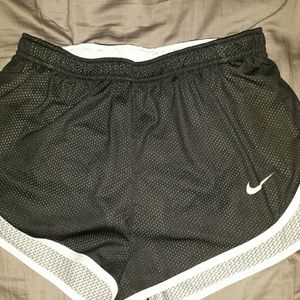 Black and gold nike shorts